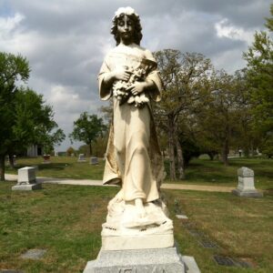 cemetery headstone statue of girl